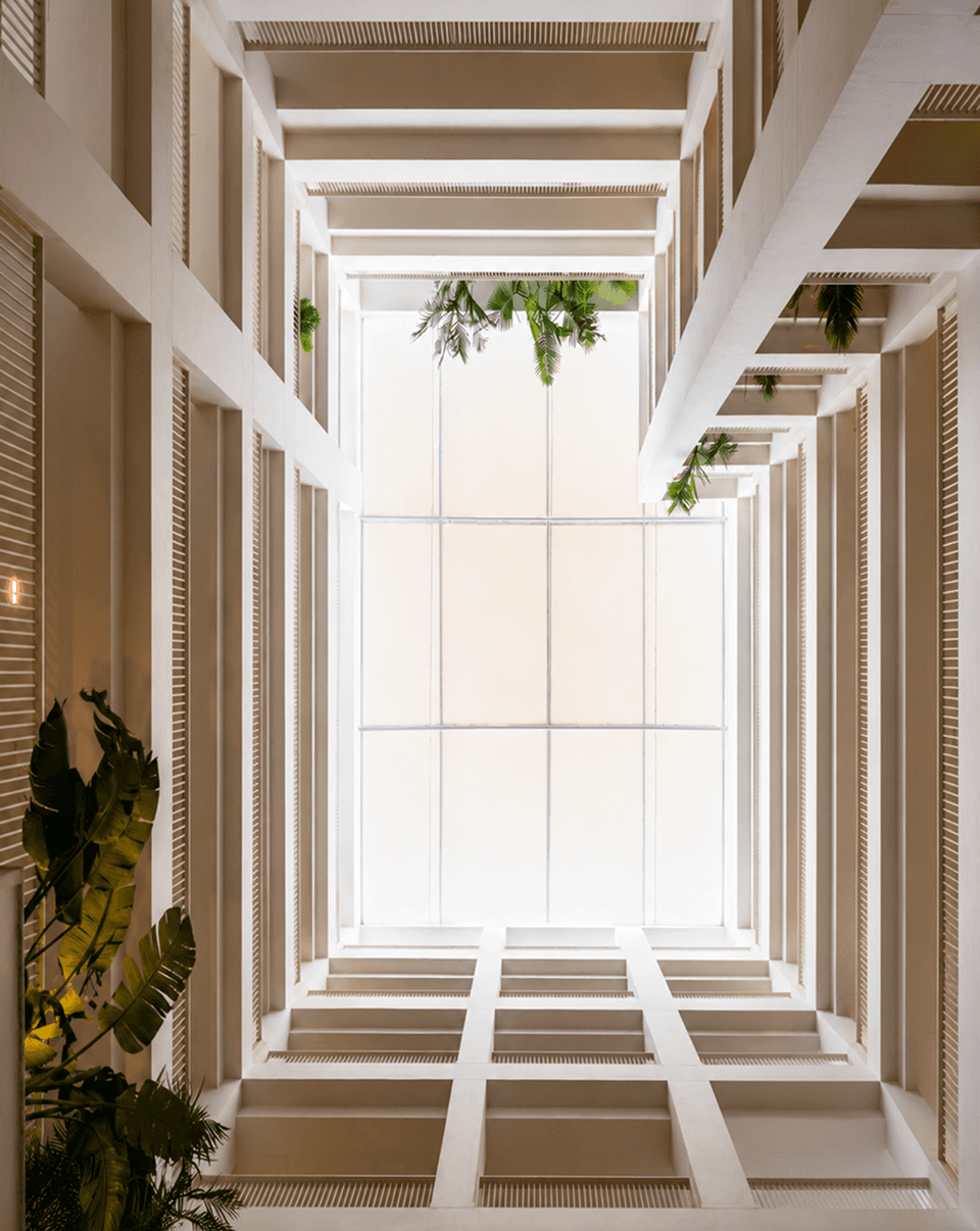 Looking up through the light-filled Alpirious atrium skylight