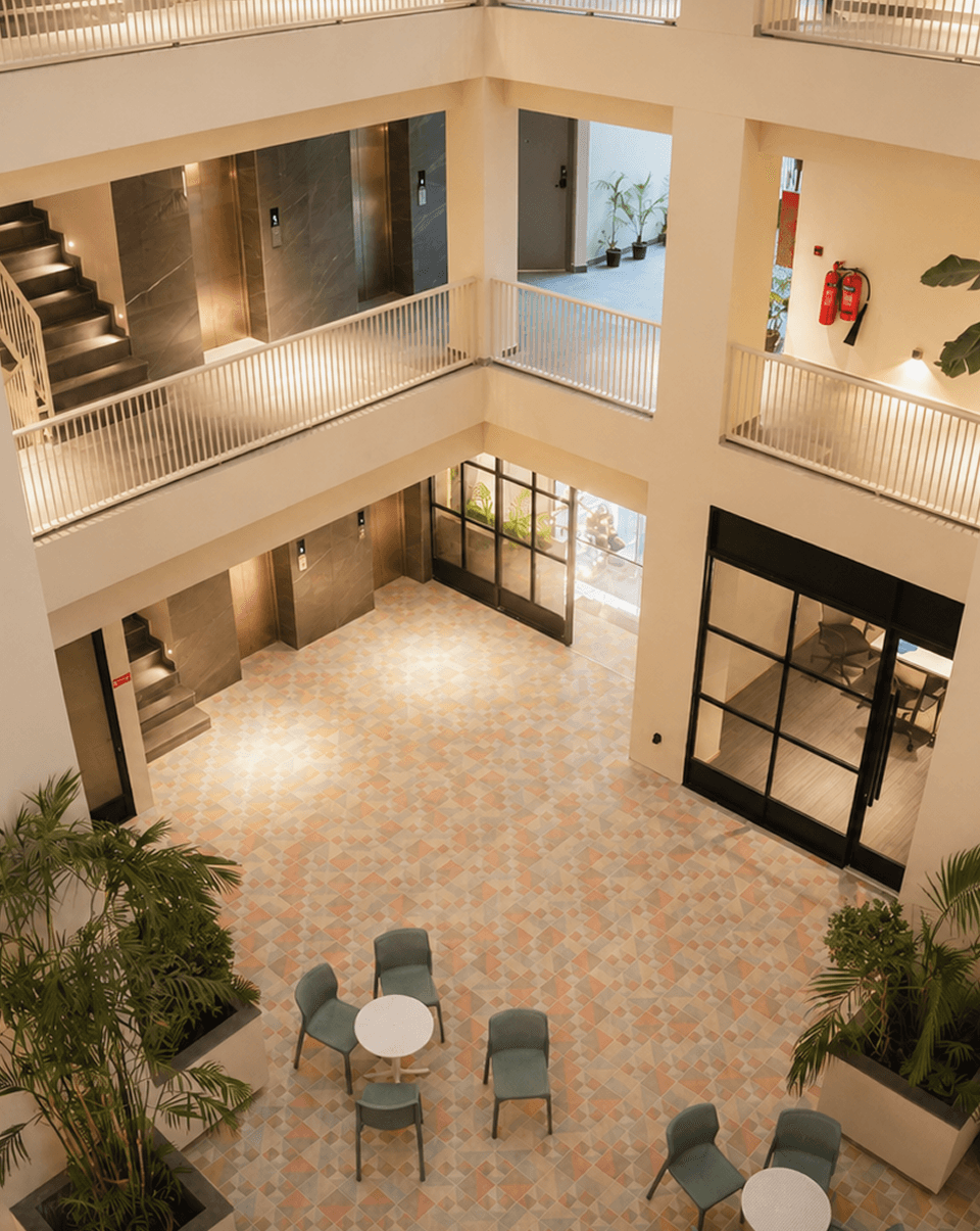 The naturally lit Alpirious atrium with lounge seating